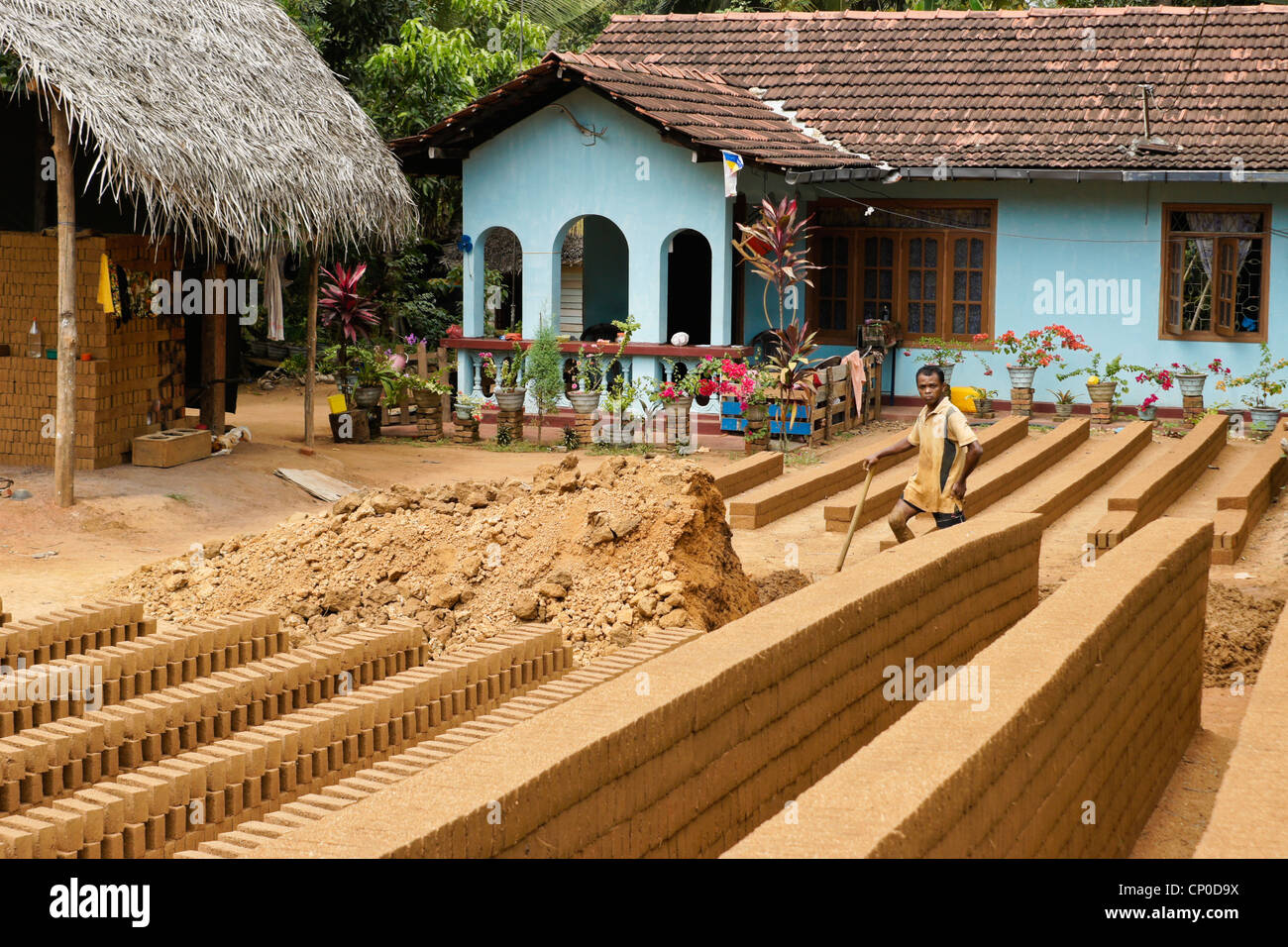 Man making mud bricks, Sri Lanka Stock Photo