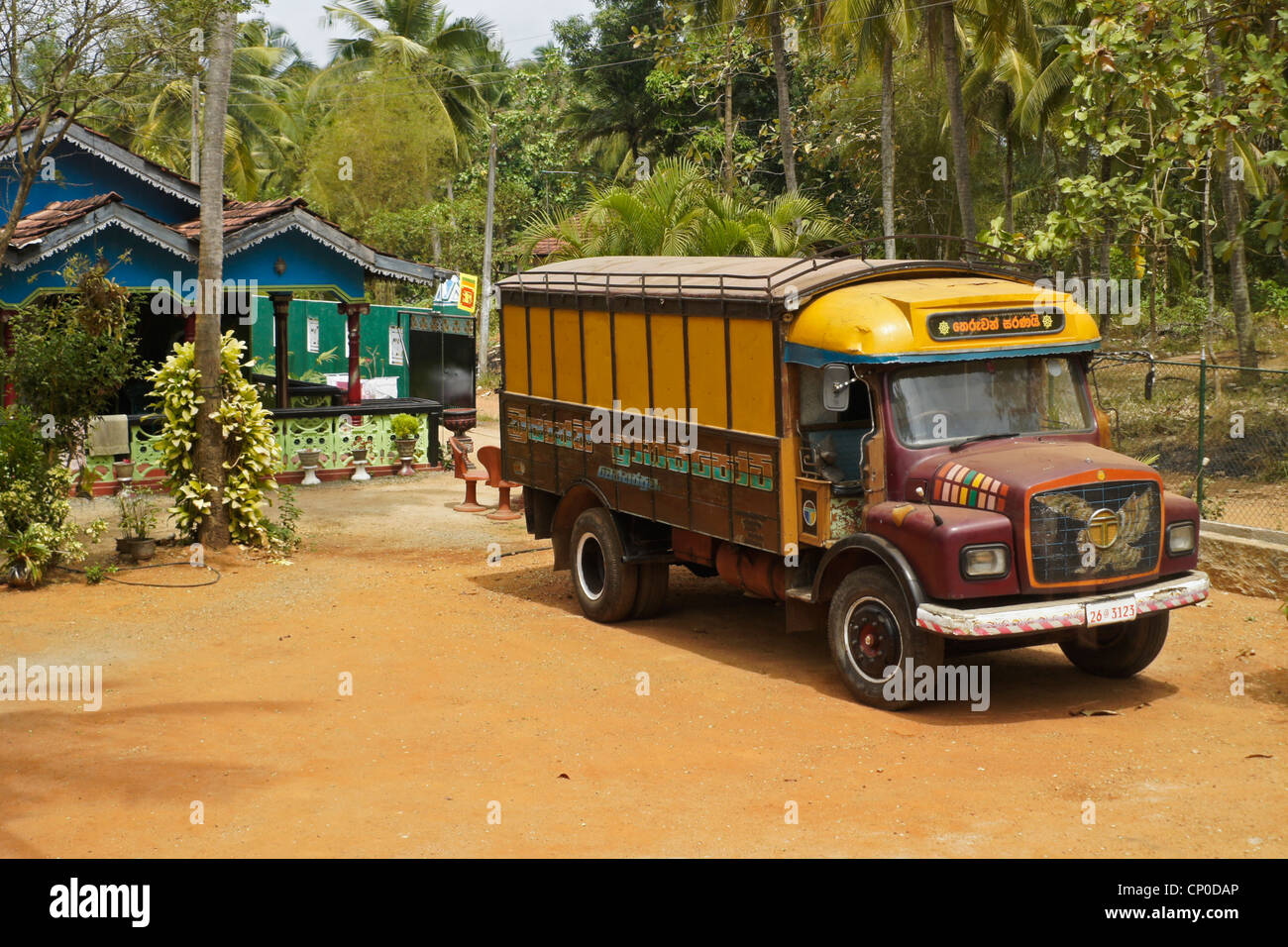 Colorful house and truck, Sri Lanka Stock Photo
