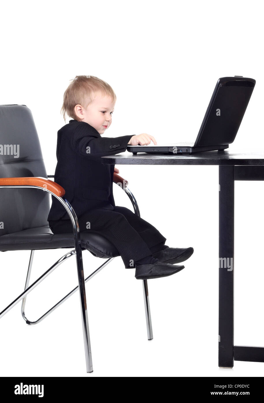 Little businessman working with computer Stock Photo - Alamy