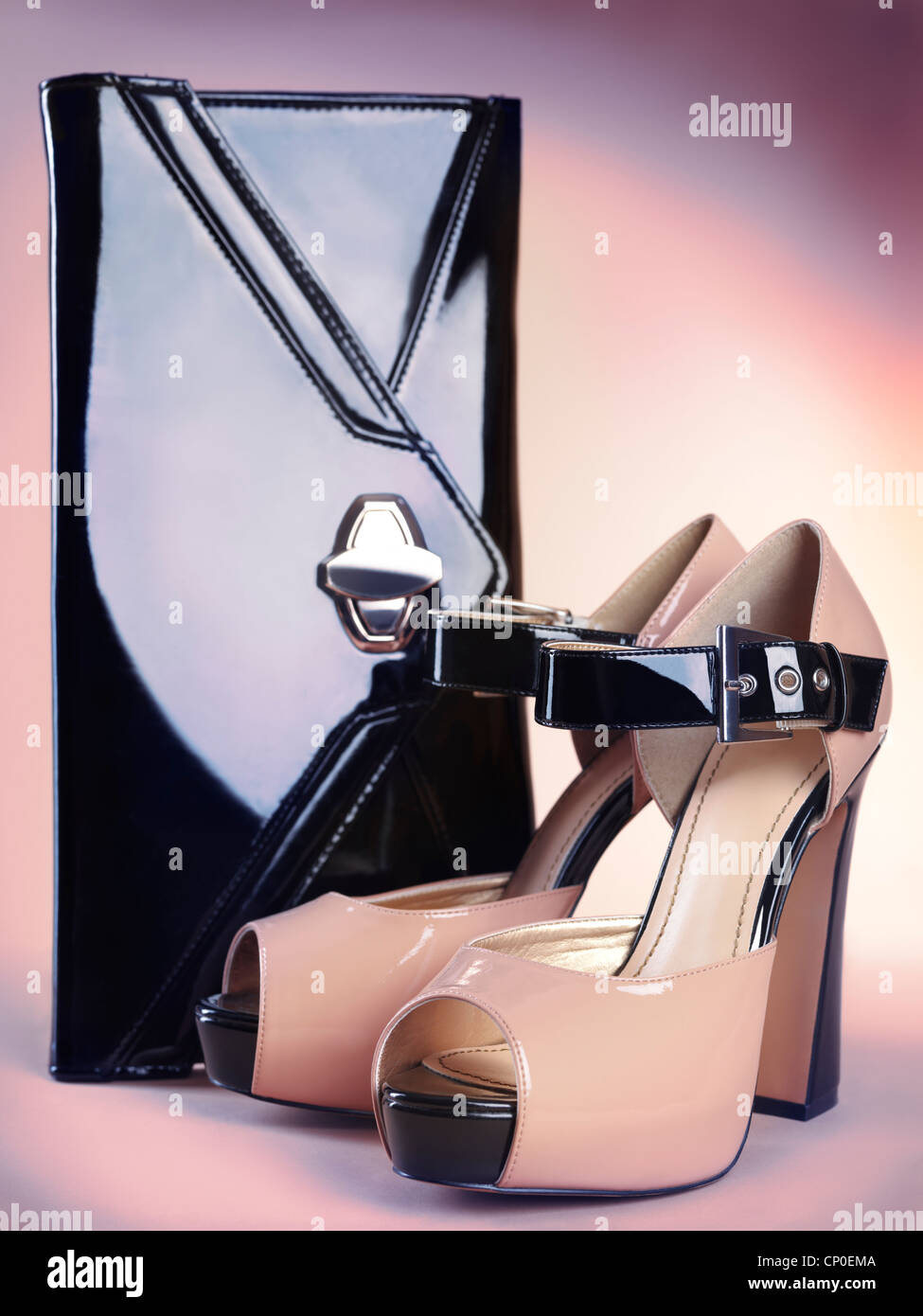 Fashion accessory still life of stylish high heel womens shoes and a clutch handbag Stock Photo