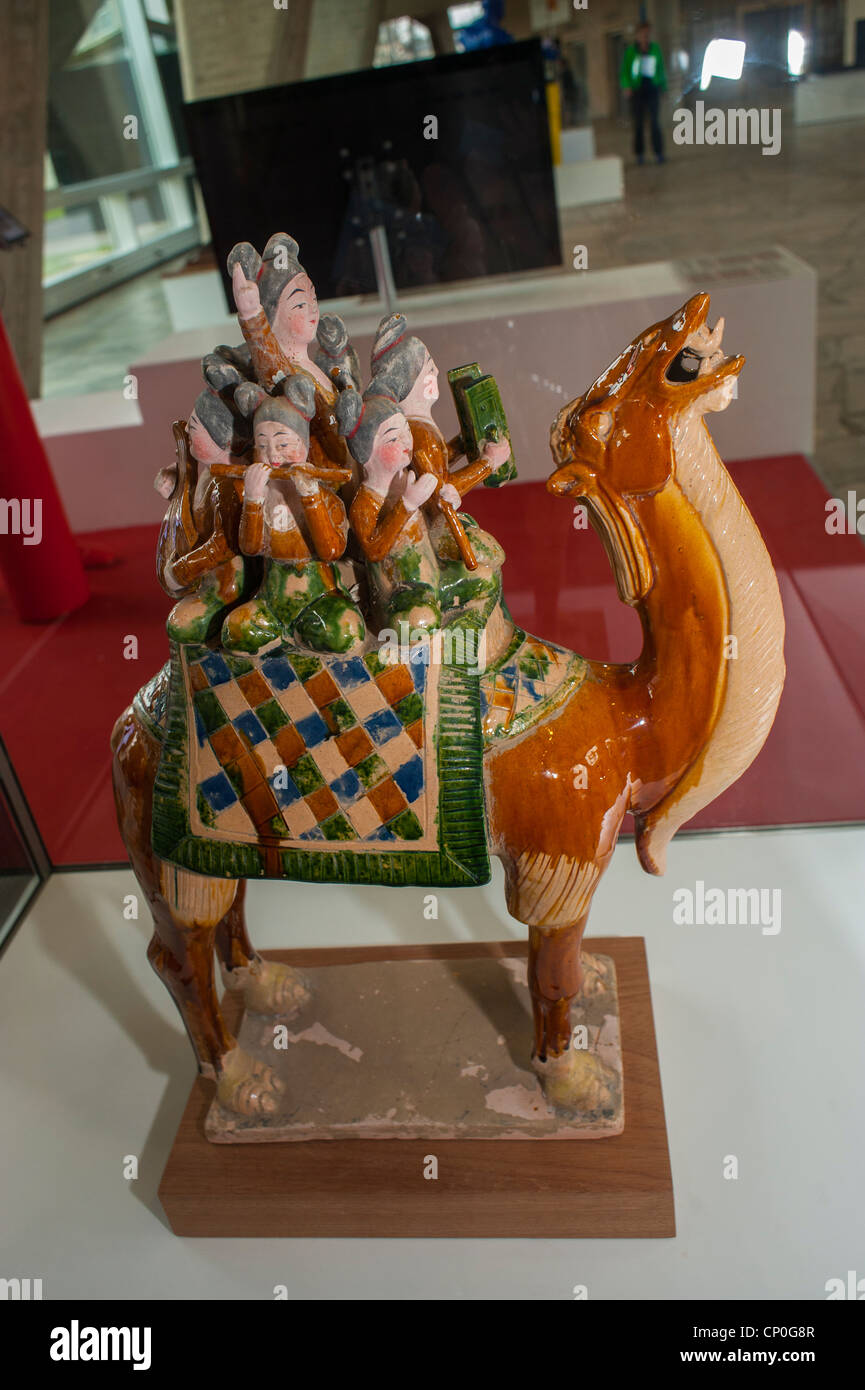 Paris, France, Chinese Ceramic Sculpture, from Tang Dynasty, (618-9074), 'Seven Musicians Riding a Camel' on Display in the UNESCO Building Stock Photo