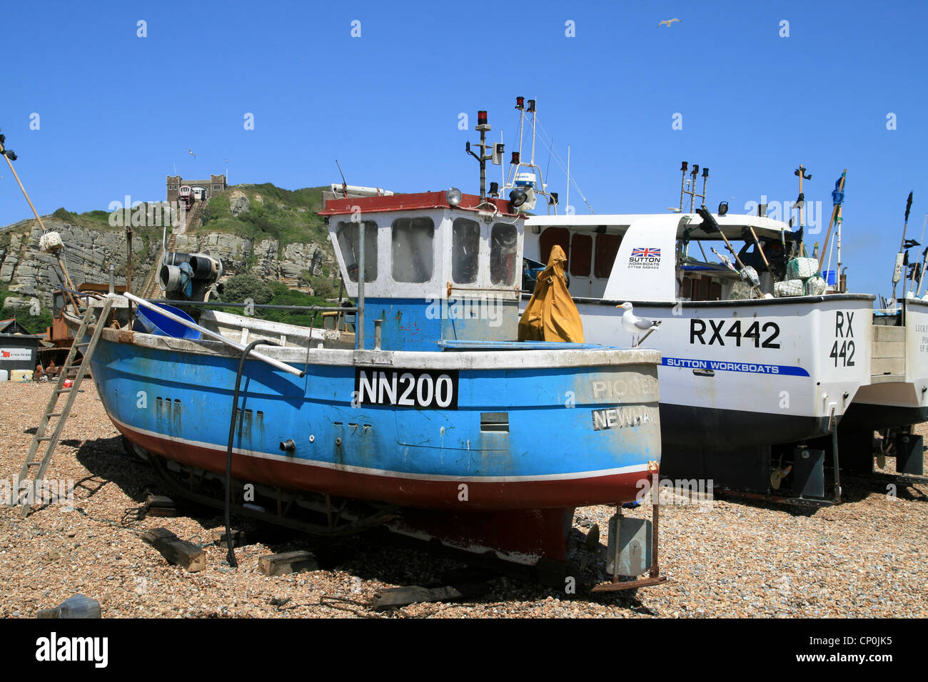 beached fishing boats Hastings East Sussex England UK Stock Photo