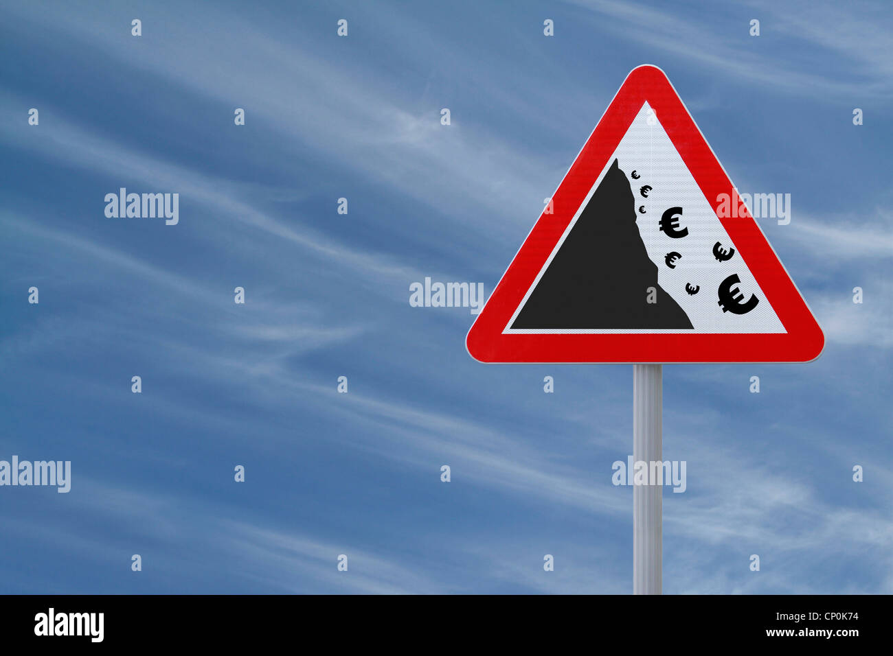 An actual road sign modified to imply the fall or devaluation of the Euro. Applicable for business or financial concepts. Stock Photo