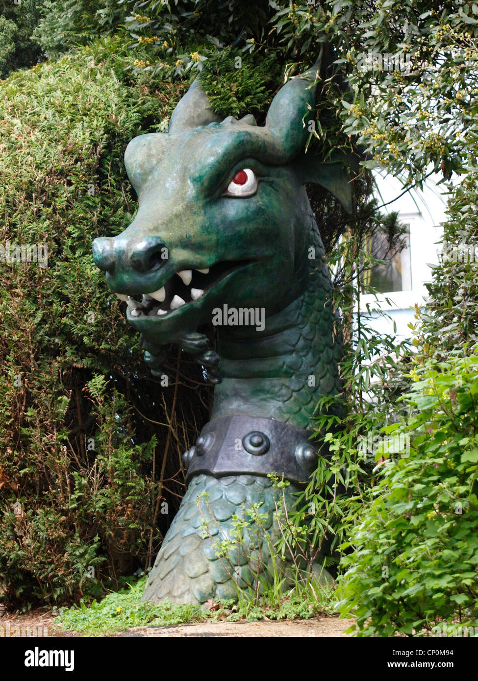 Dragons head garden ornament, UK Stock Photo