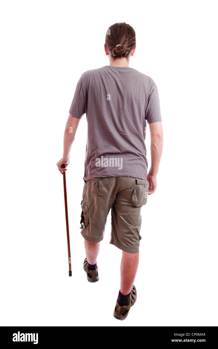 A man (back) using the support of a cane. Stock Photo