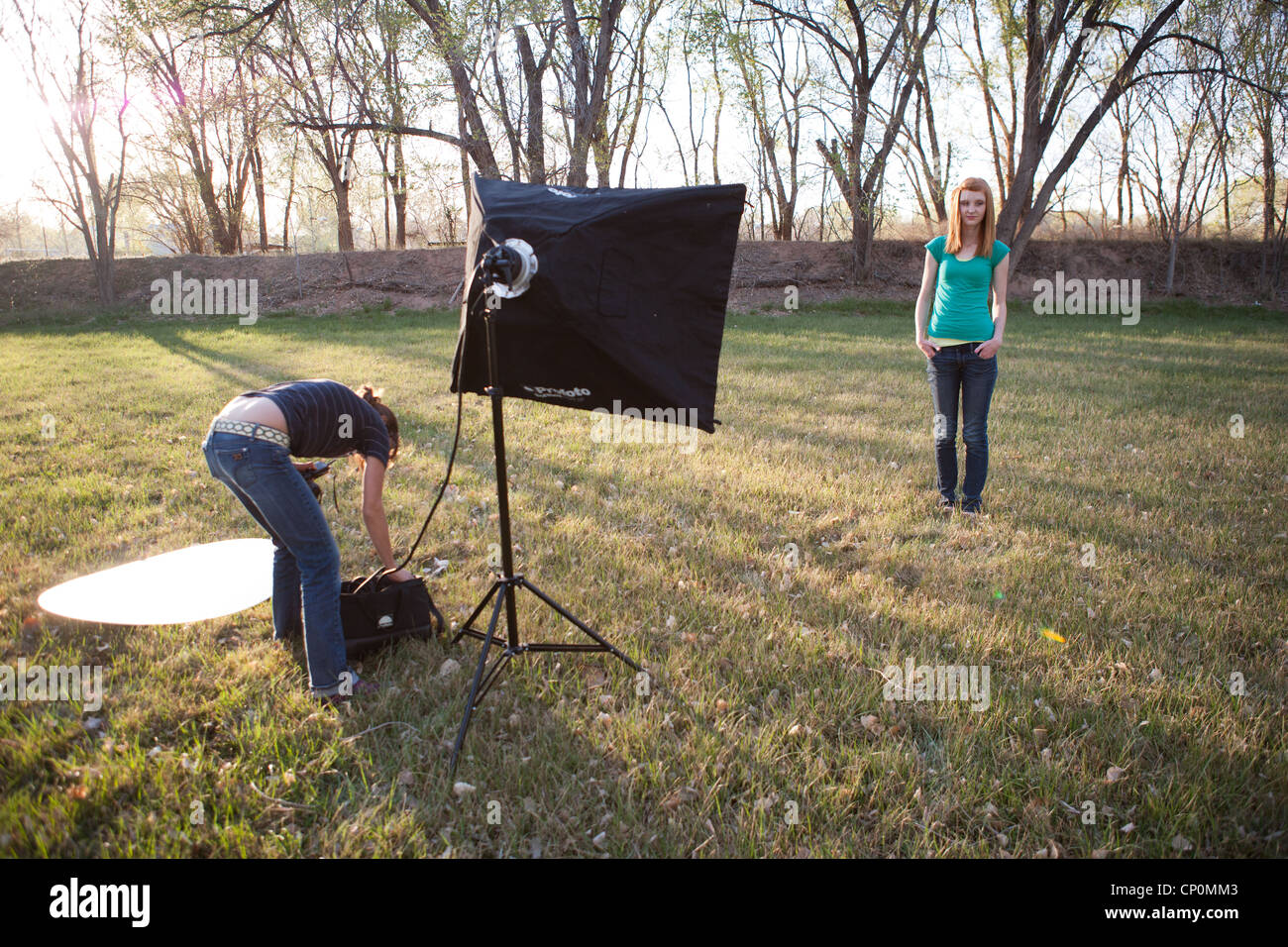Photo shoot outdoors with teen model in a rural area. Stock Photo