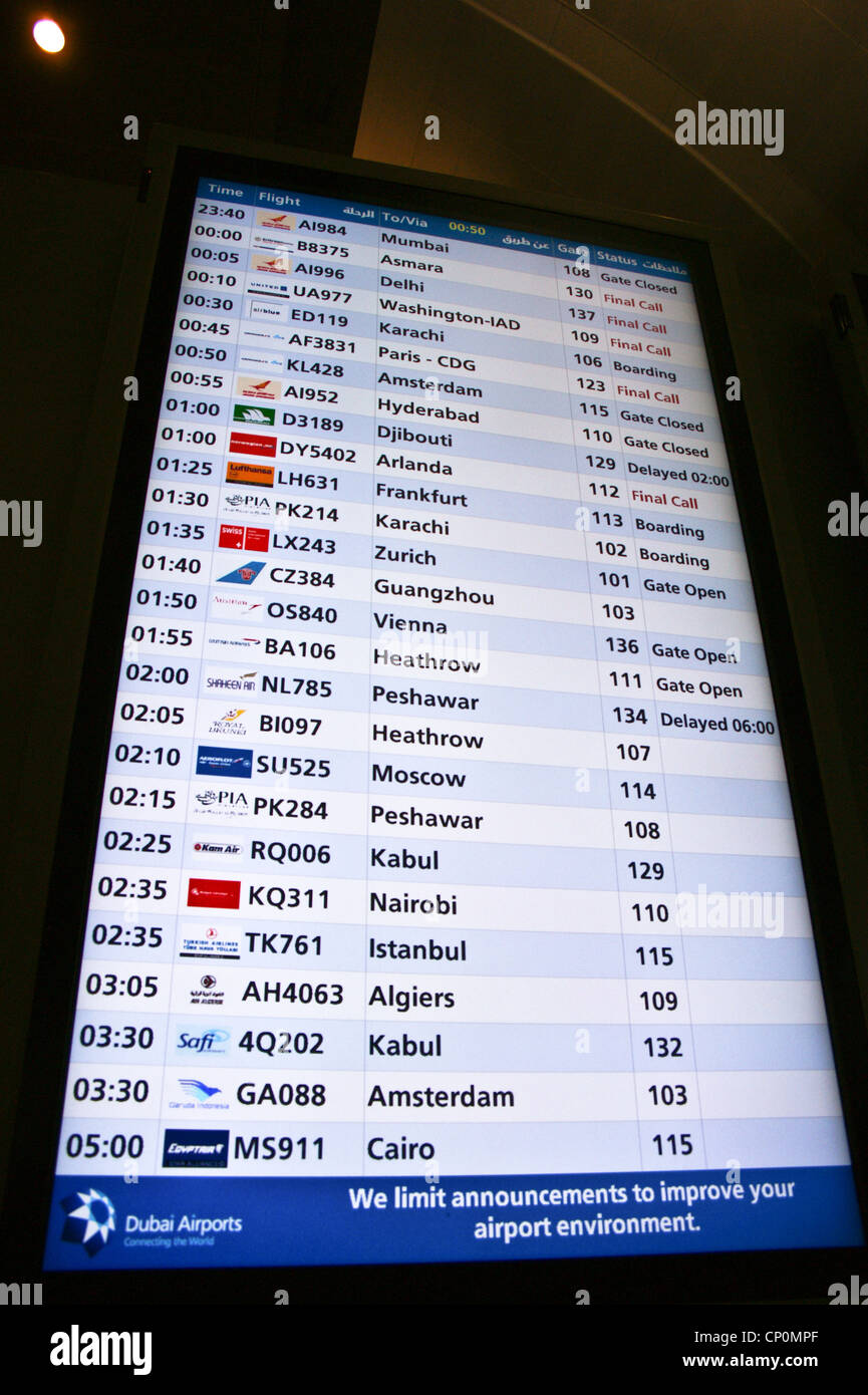 Airport departure board sign at Dubai international airport, Dubai, United Arab Emirates Stock Photo