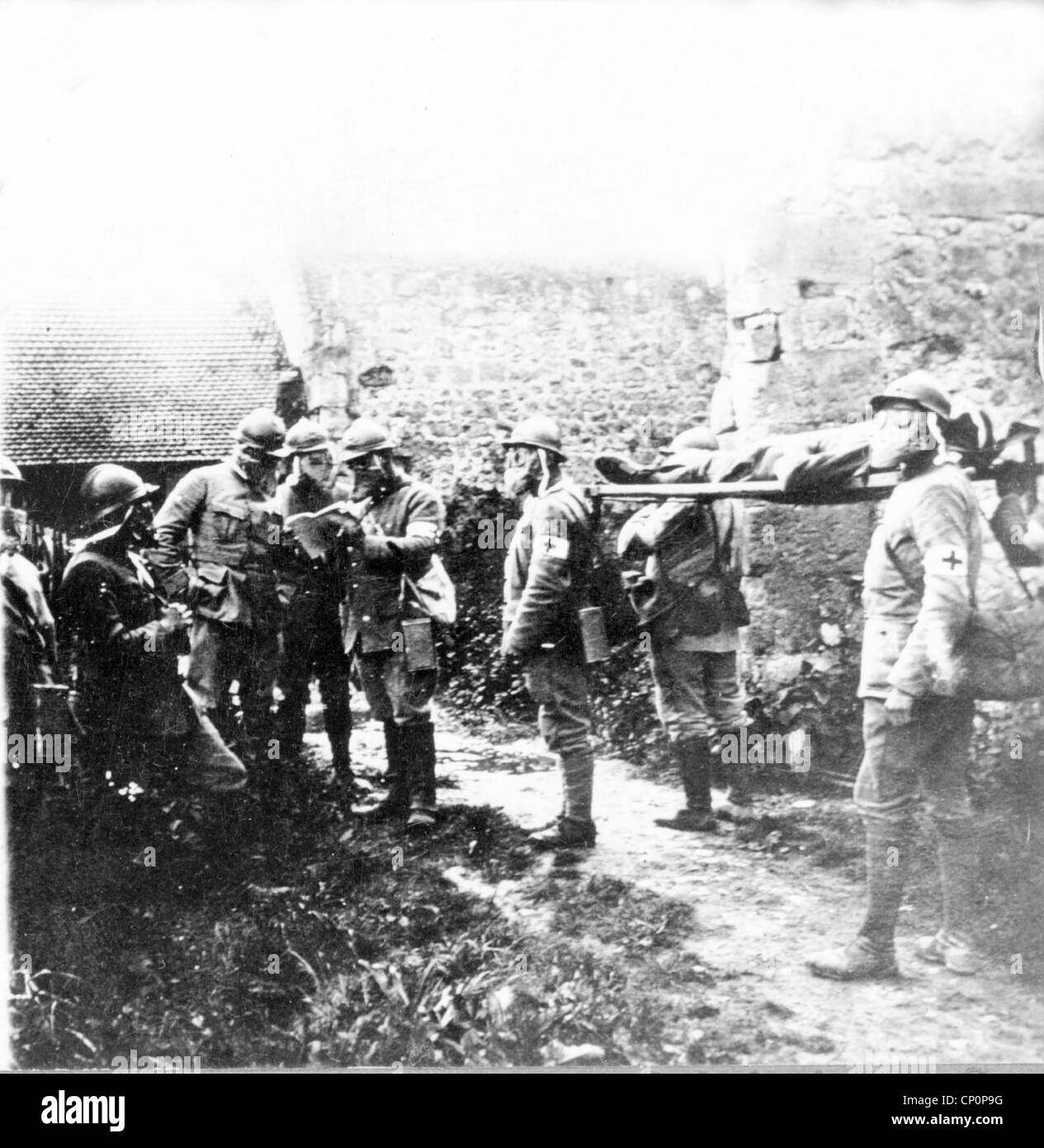 Wounded being treated during a wartime gas attack Stock Photo