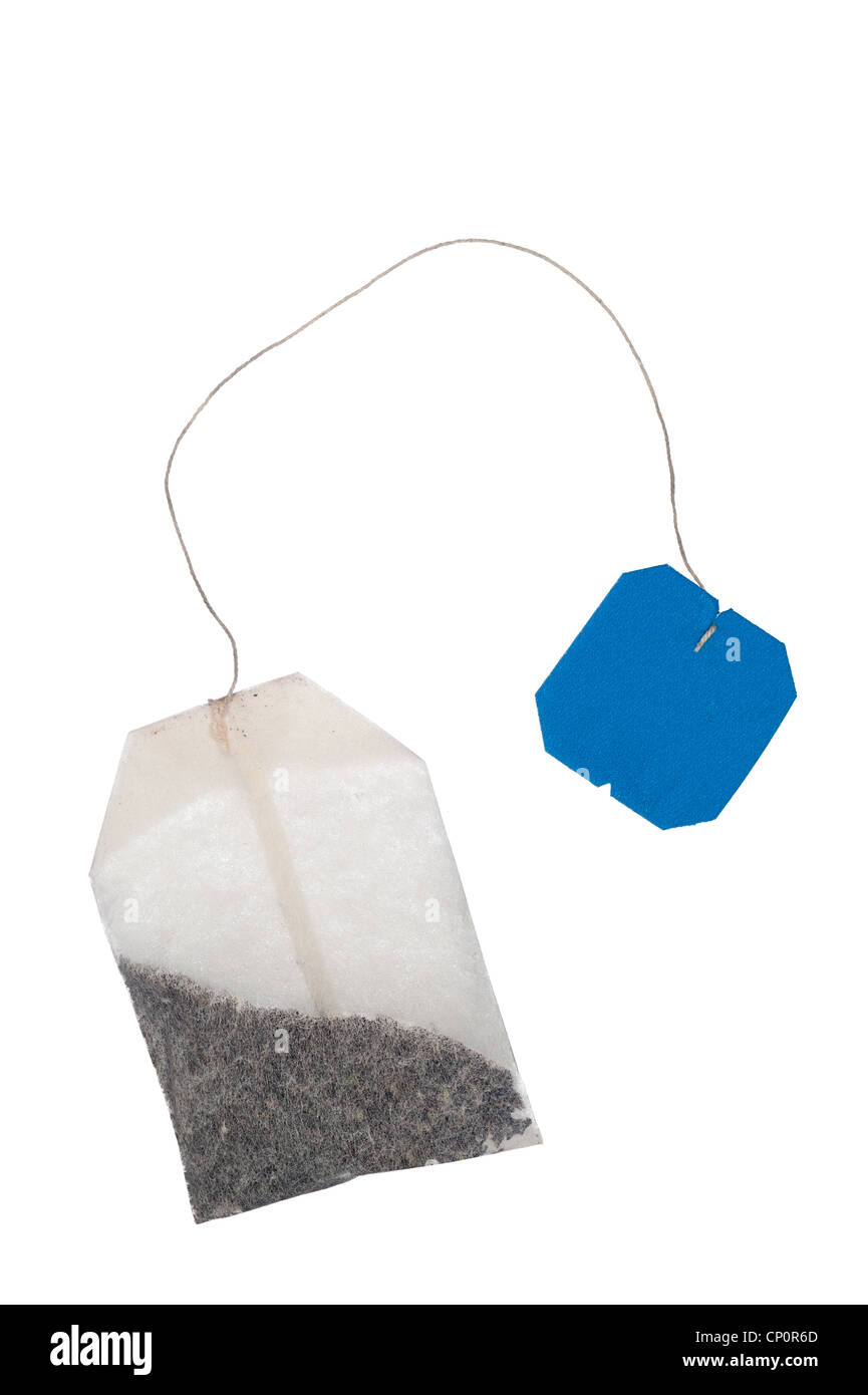 A new herbal teabag with string and blank label isolated on white. Stock Photo