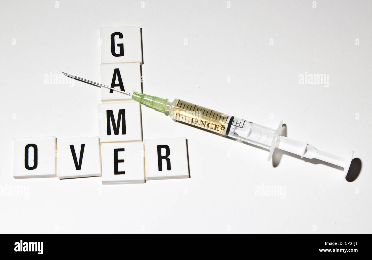 medical syringe with text game over Stock Photo Alamy