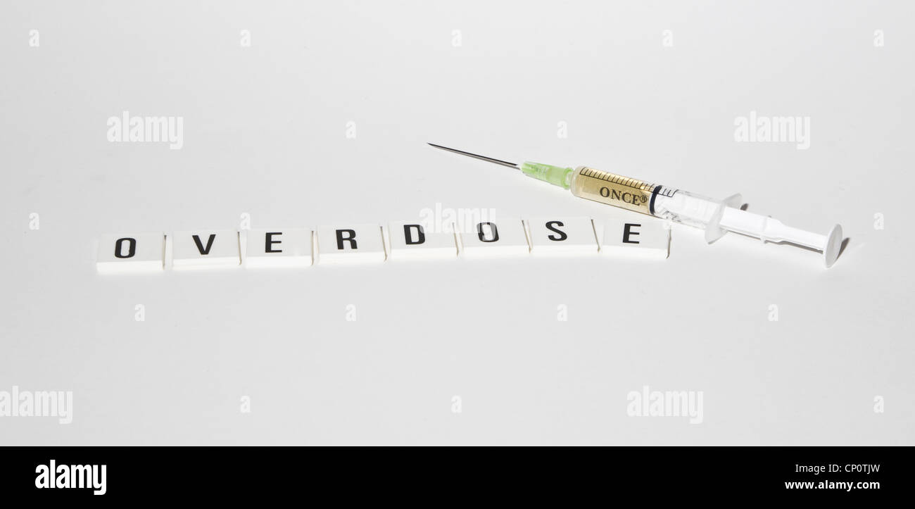 medical syringe with text overdose Stock Photo