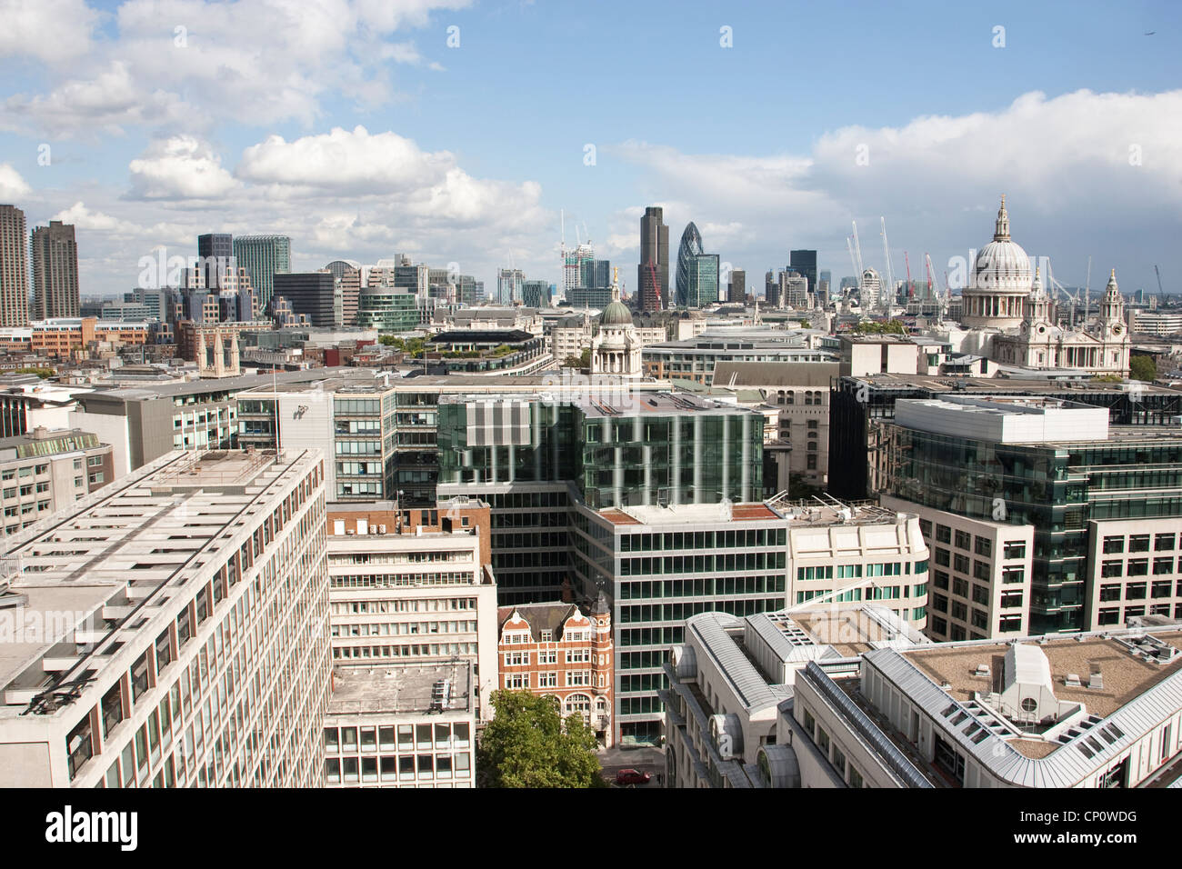 Wide-angle Cityscape across the skyline of the City of London, showing the financial district in the distance, England, UK Stock Photo