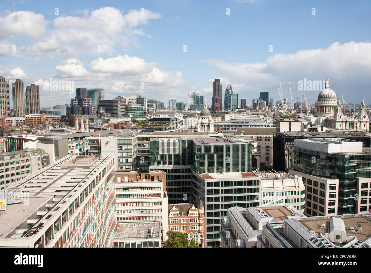 Wide-angle Cityscape across the skyline of the City of London, showing the financial district in the distance, England, UK Stock Photo