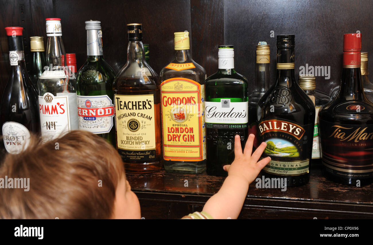 Alcoholic drinks within a child reach Stock Photo Alamy