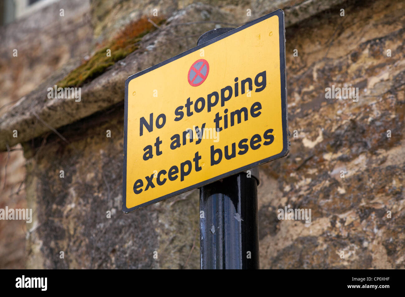 No stopping at any time except buses road sign in UK Stock Photo