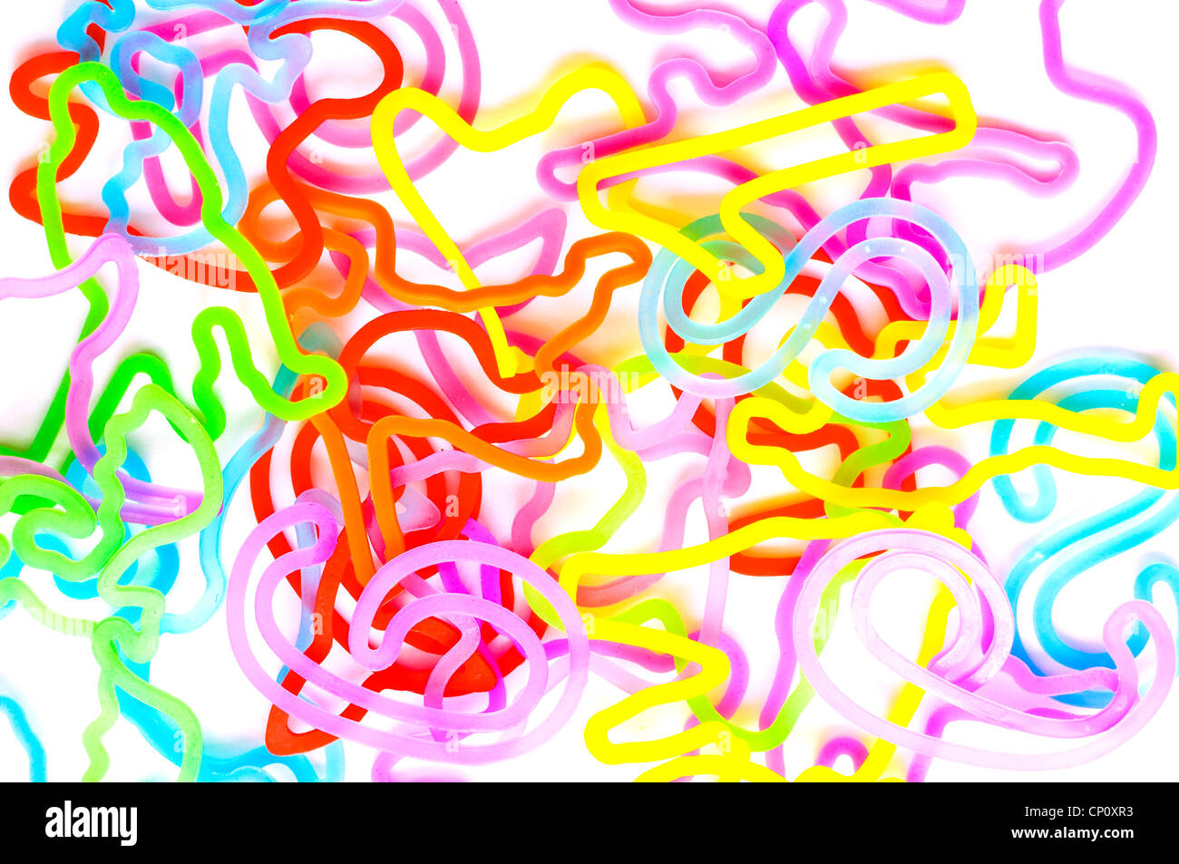 Collection of Silly bandz - colored rubber silicone bands with different shapes on white background Stock Photo