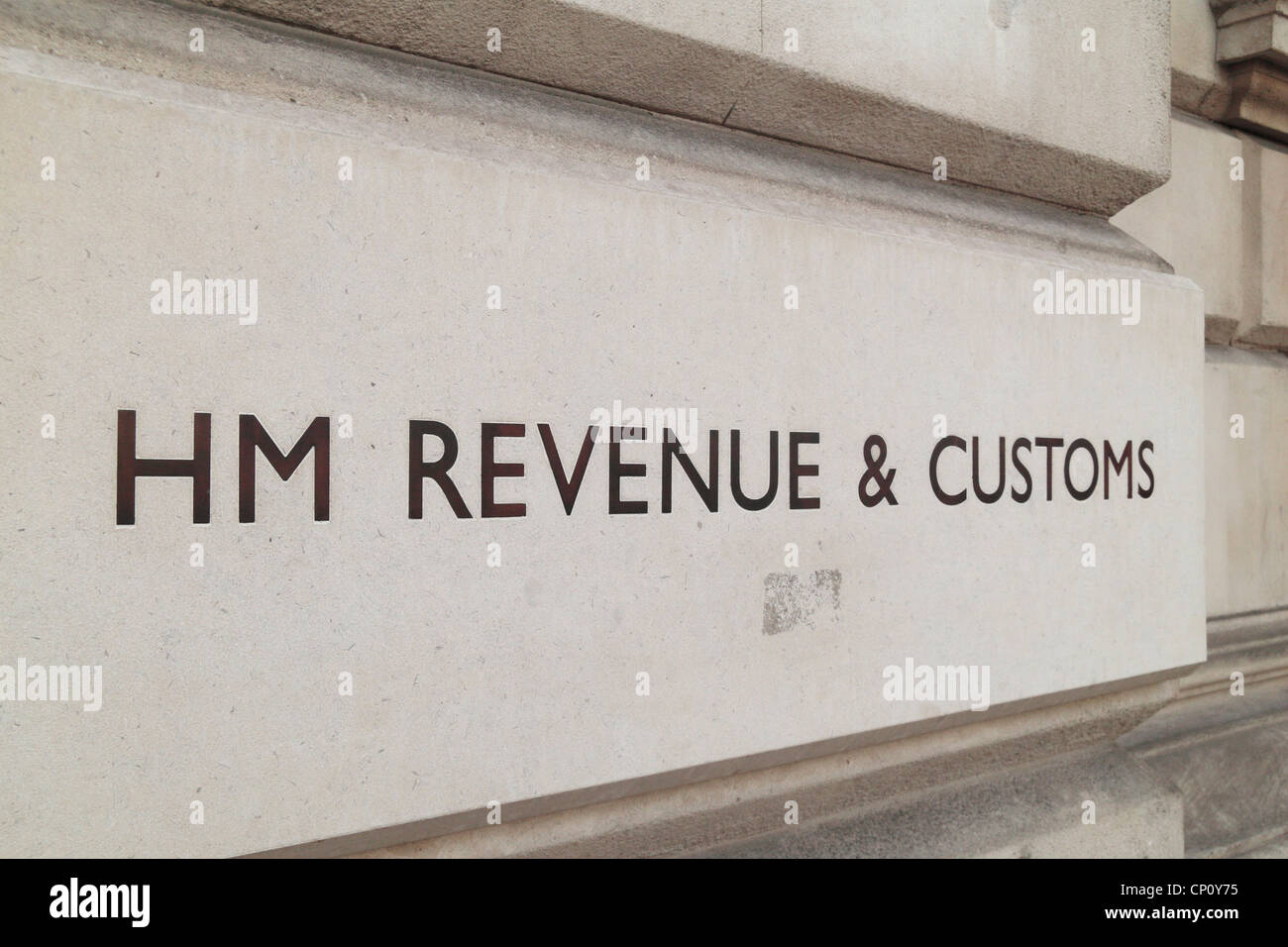 The HM Revenue & Customs logo outside the Government offices on Whitehall, London, UK. Stock Photo