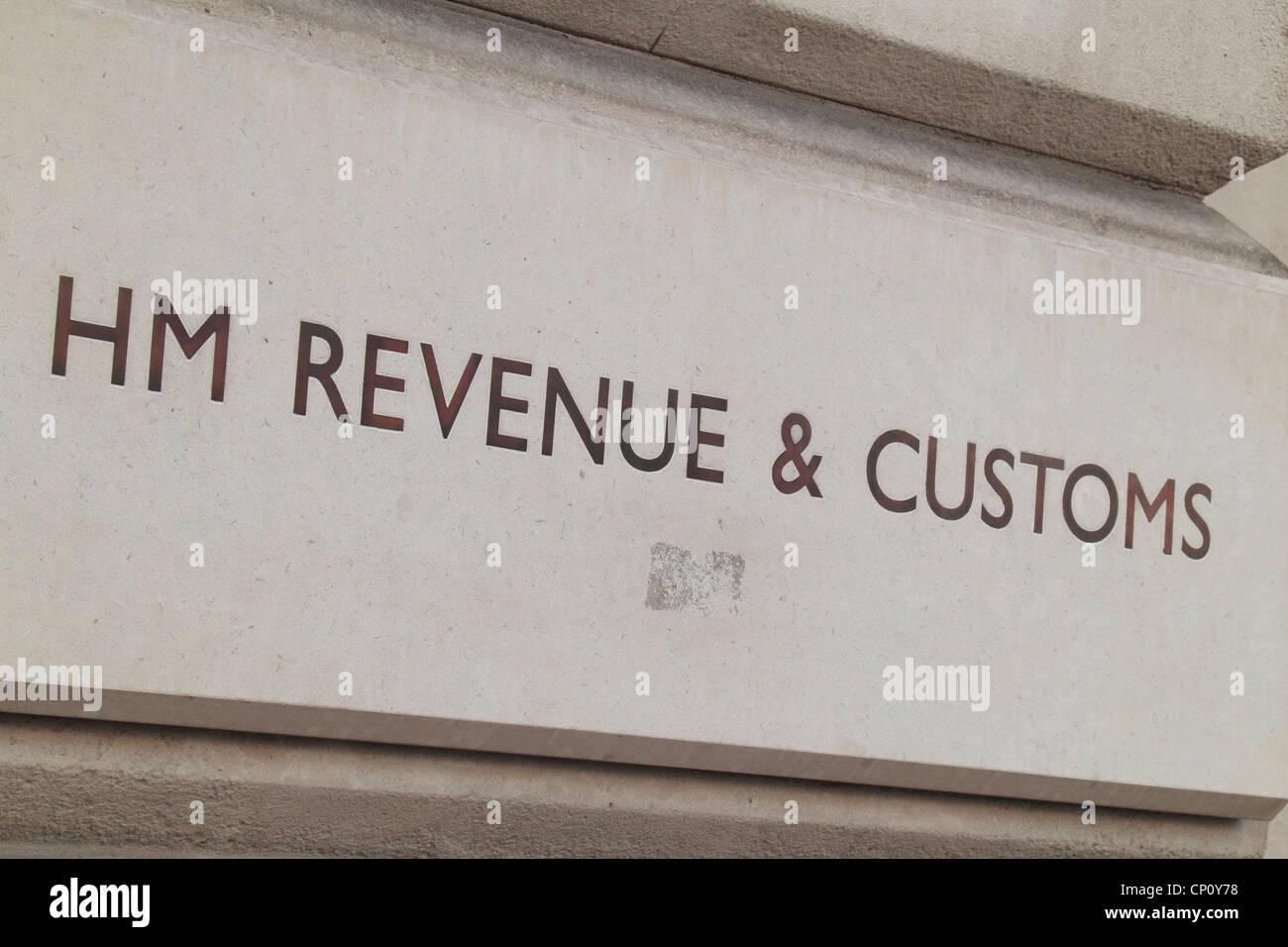 The HM Revenue & Customs logo outside the Government offices on Whitehall, London, UK. Stock Photo