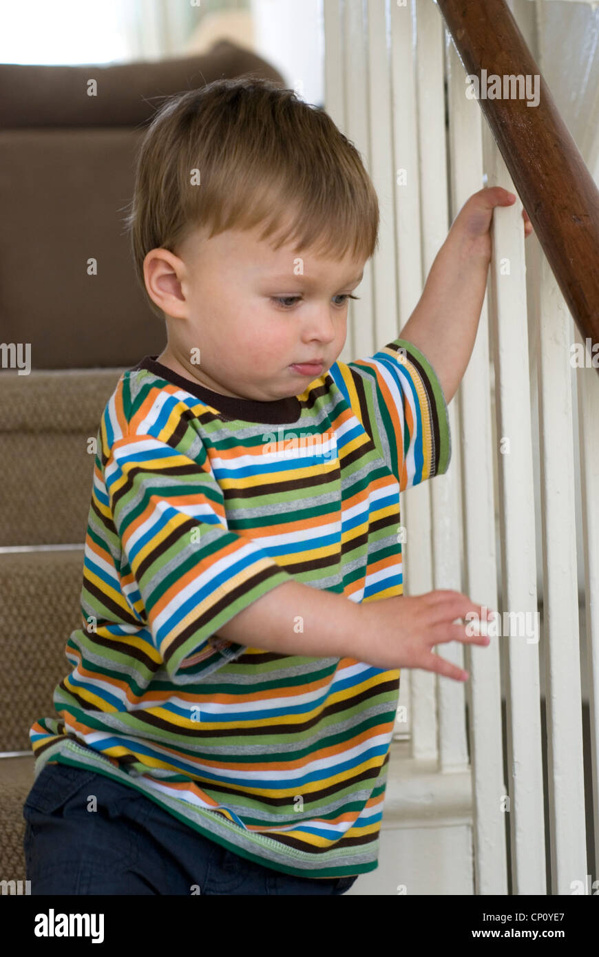 Toddler having a tantrum on a staircase Stock Photo Alamy
