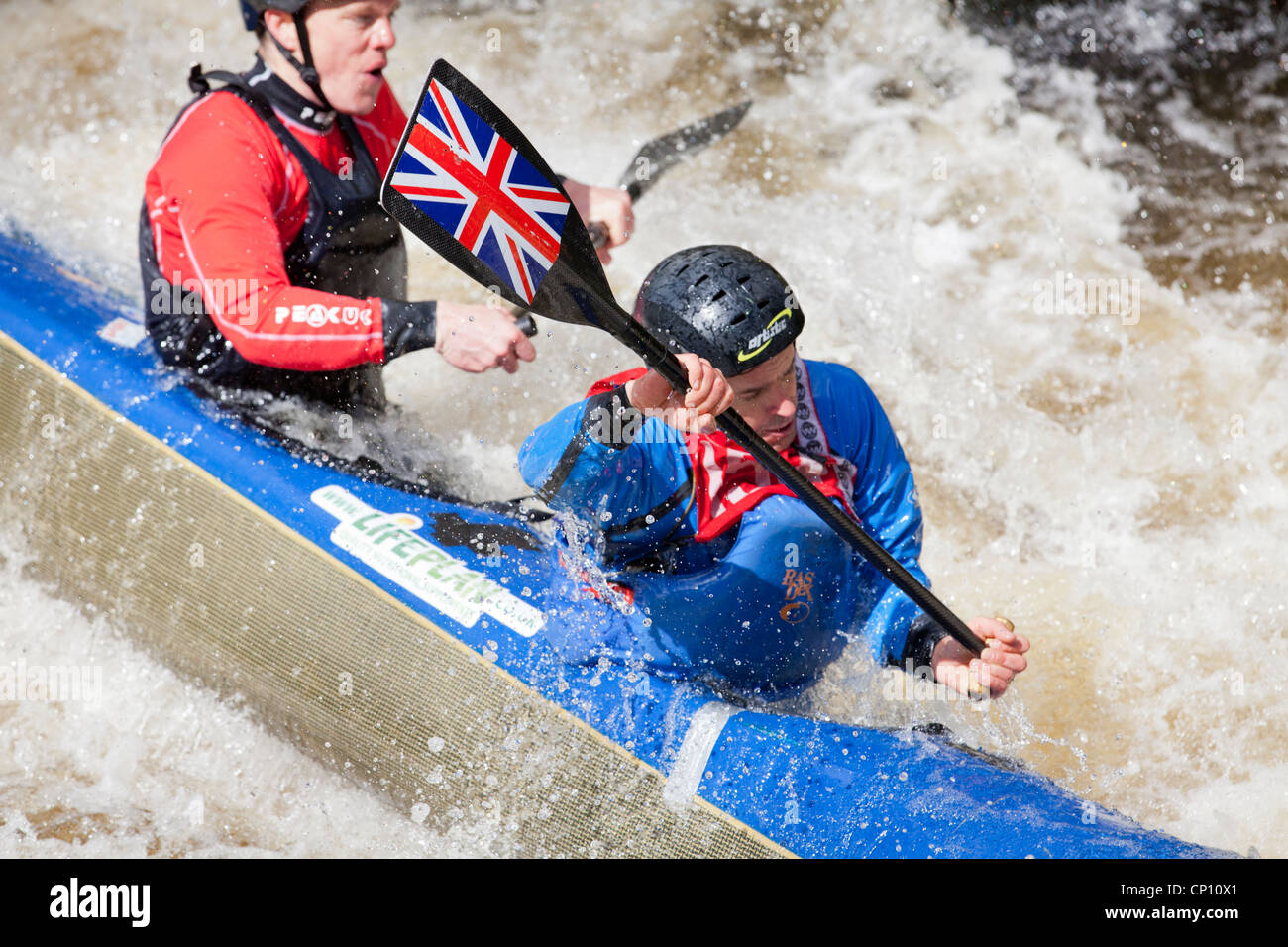 two man canoe white water kayaking in bala north wales, snowdonia