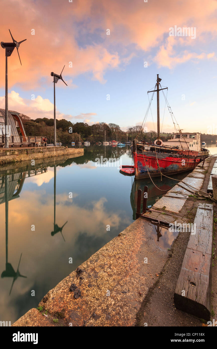 Boats captured at sunset from the quay at Penryn in Cornwall Stock Photo