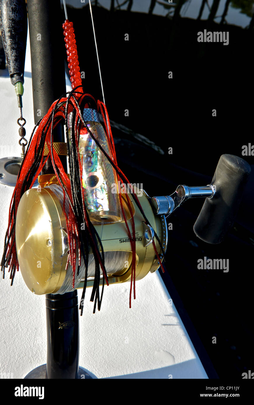 Ballyhoo hoochie rig high speed trolling lure Shimano LRS deep sea fishing reel rod Stock Photo