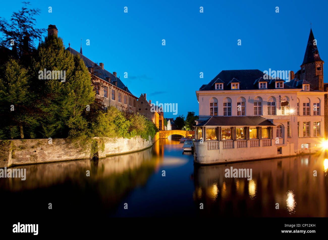 Typical houses besides a canal Bruges, Belgium. Stock Photo