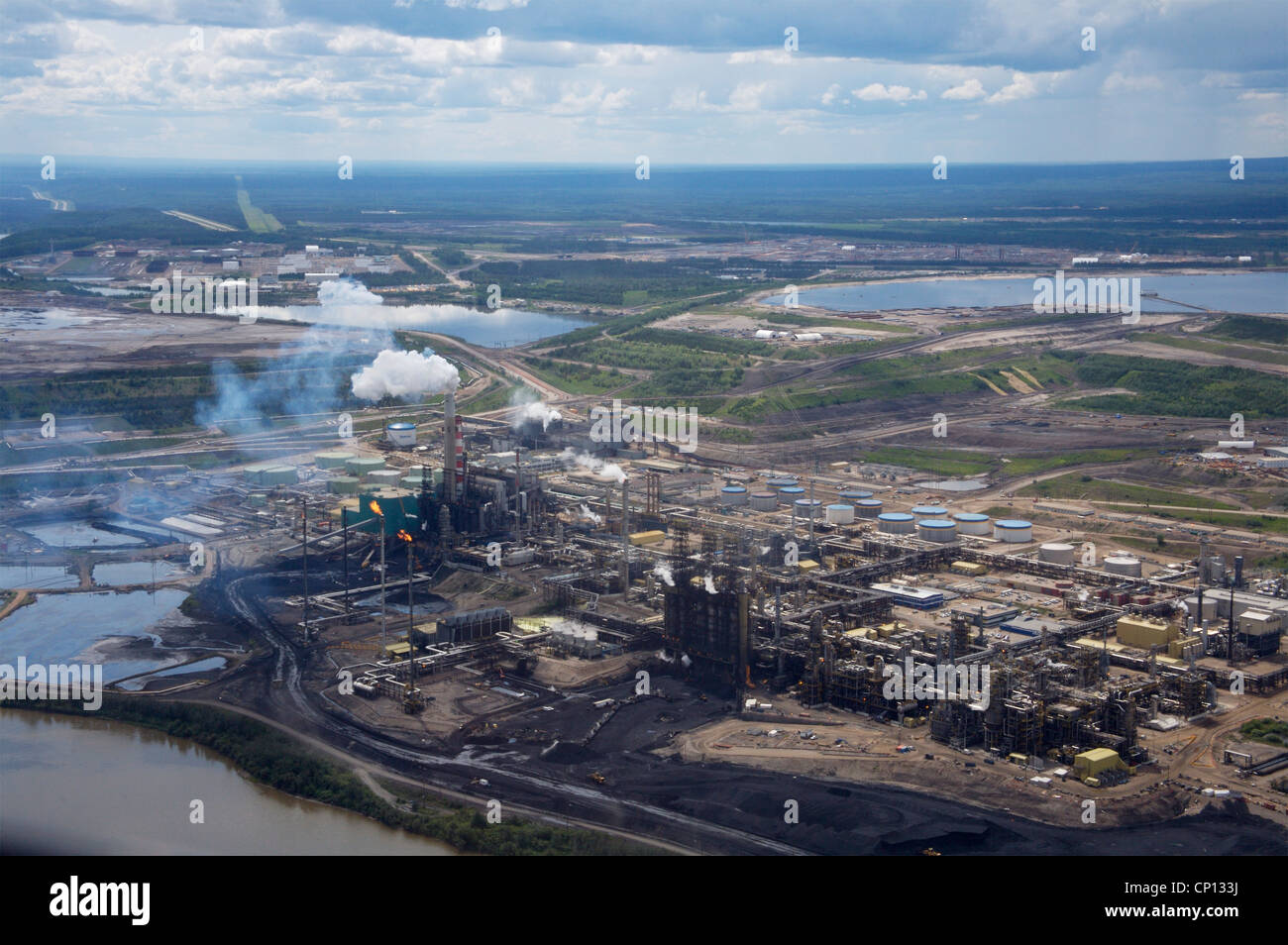Refinery and tailing ponds near Athabasca river, Fort McMurray, Alberta