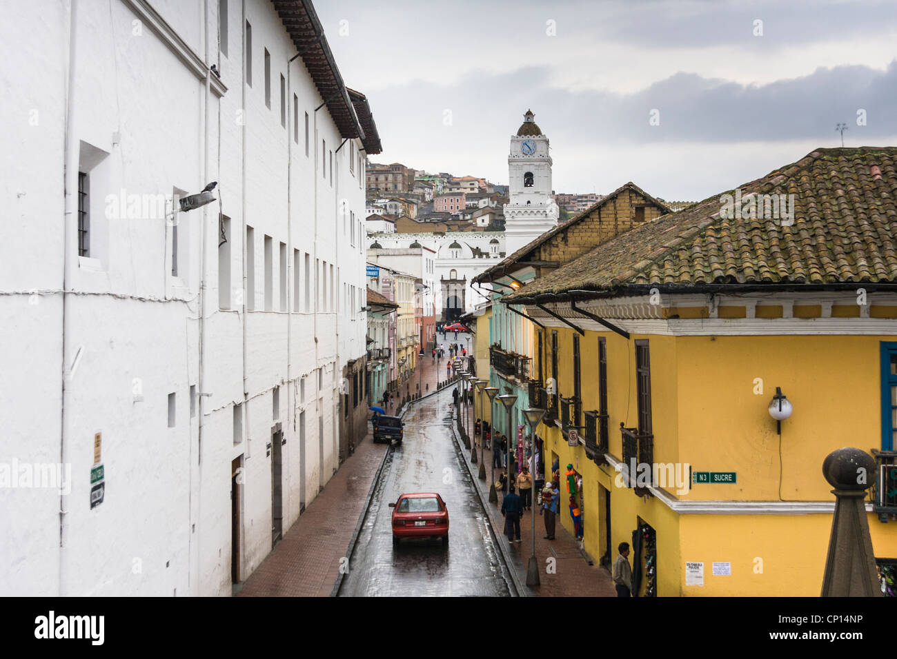 Street scene in Old Town, Quito, Ecuador - in the rain. Quito is in a rainforest, so rain is to be expected. Stock Photo