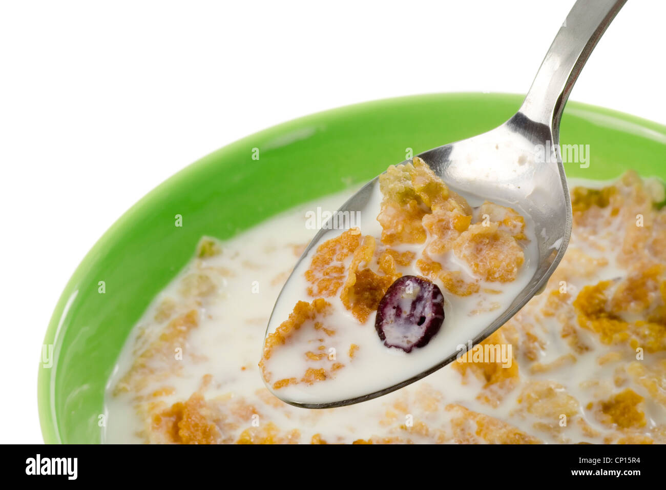 Spoonful of cereal with milk isolated on white background Stock Photo