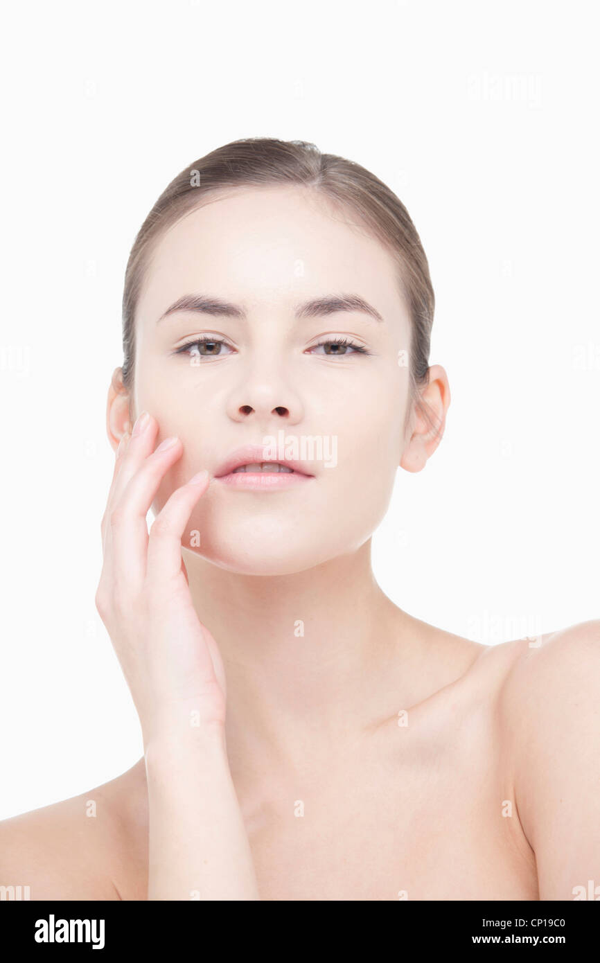 A woman covering her face Stock Photo Alamy