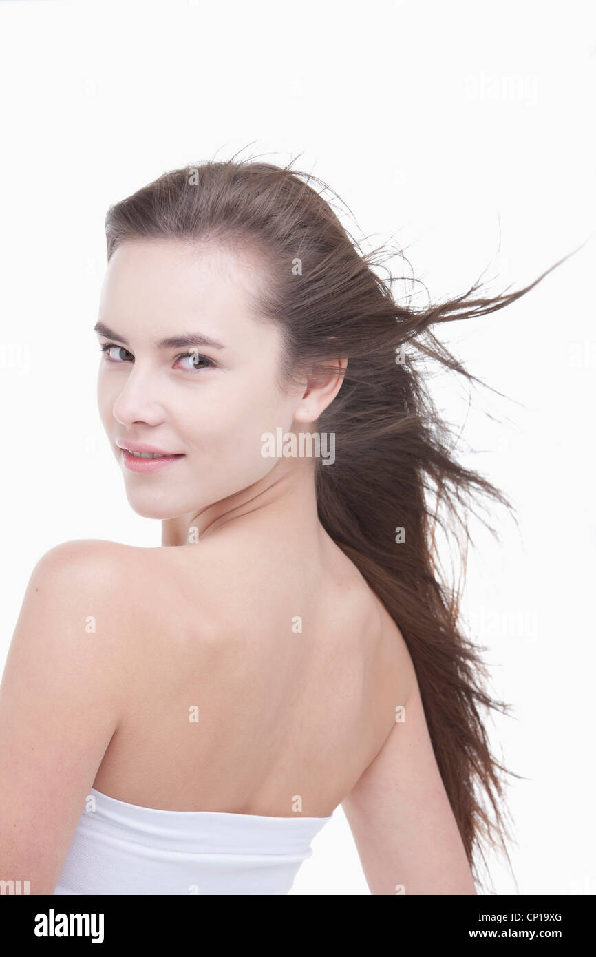 A woman with windblown hair Stock Photo Alamy