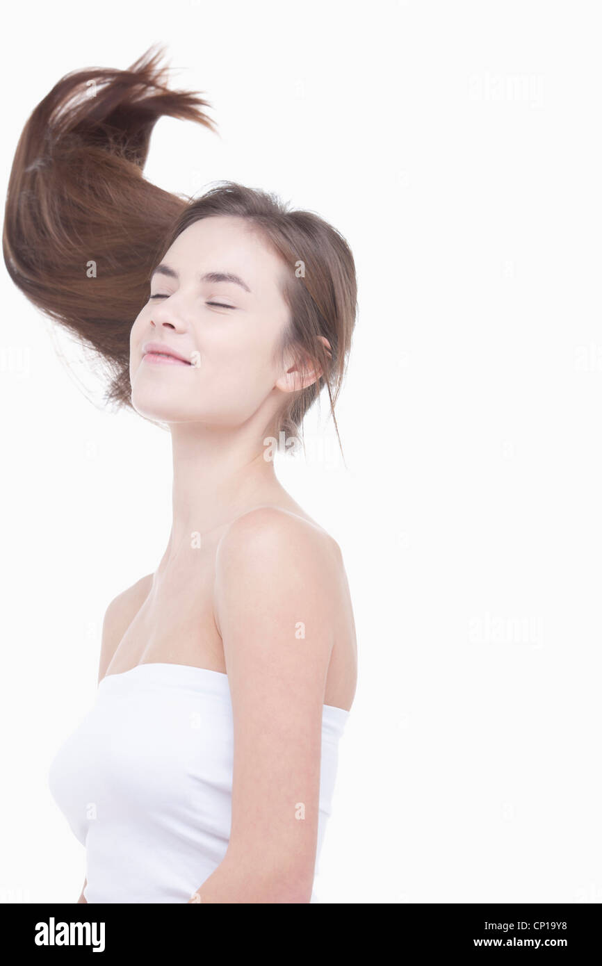 A woman with windblown hair Stock Photo Alamy