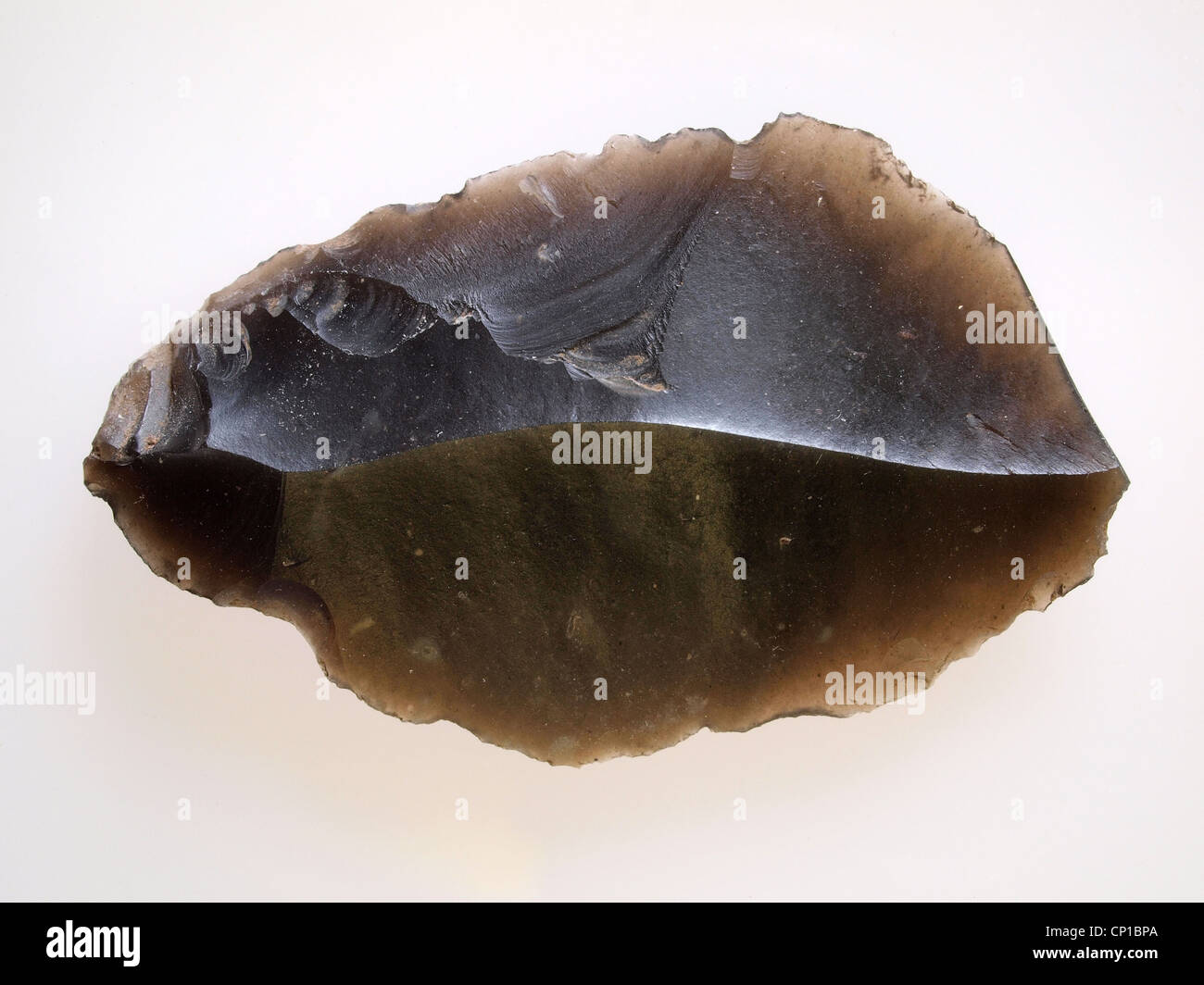 Neolithic flint implement Stock Photo