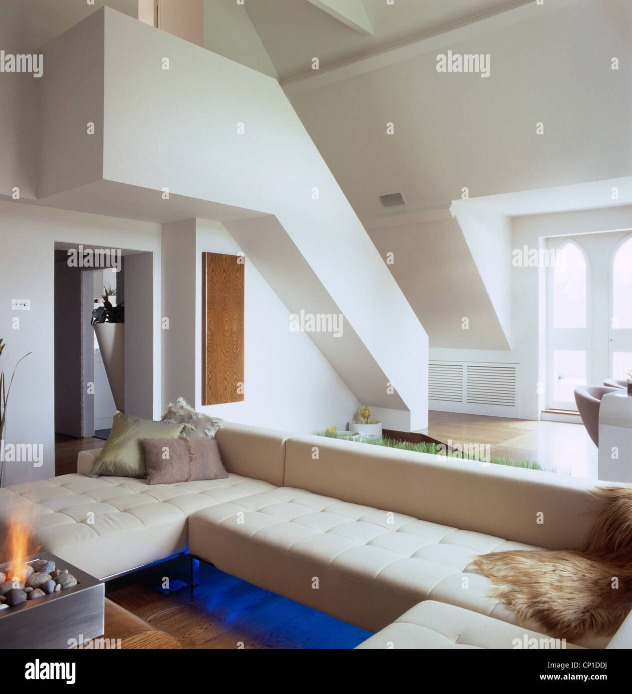 Upholstered Seating In Front Of Fireplace In Contemporary Sitting