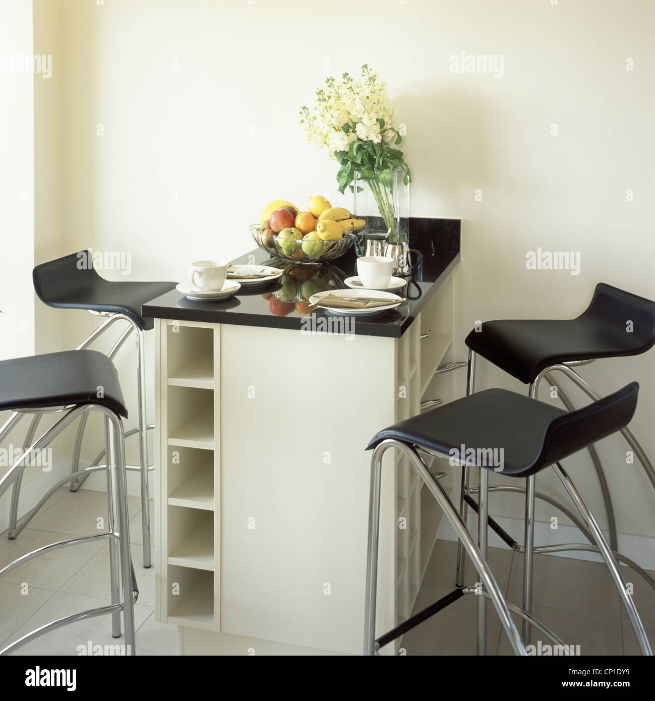 Kitchen breakfast bar with stools Stock Photo Alamy