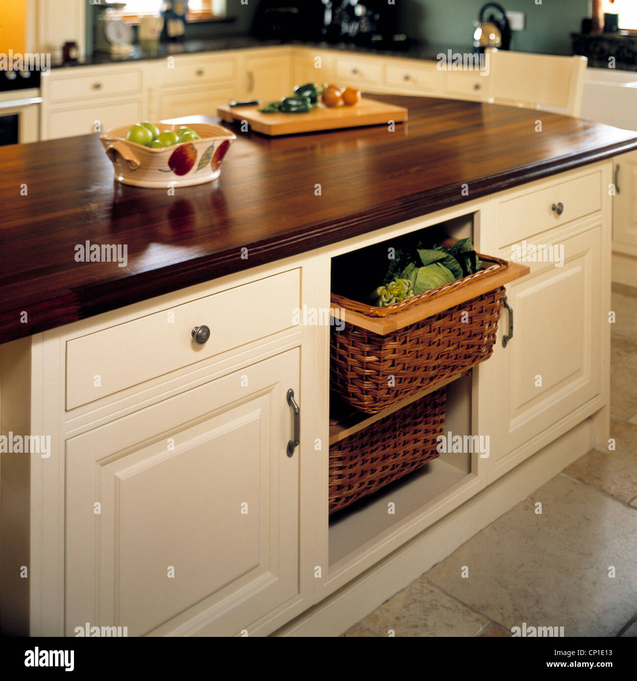 Central island unit breakfast bar in modern country style kitchen Stock Photo