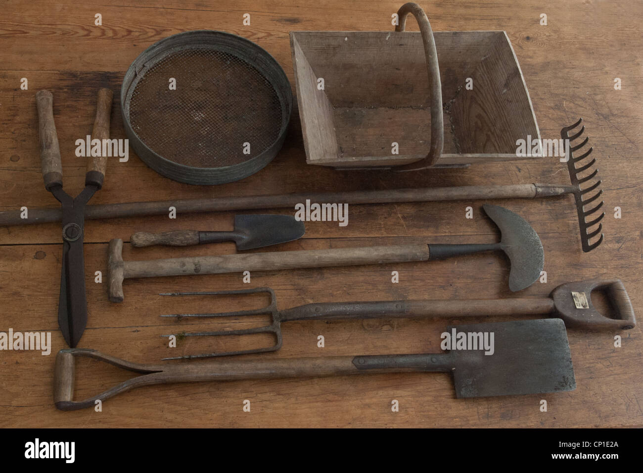 Garden tools on wooden background Stock Photo - Alamy