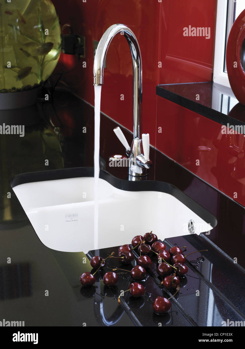 Stainless steel mixer table over kitchen sink Stock Photo Alamy