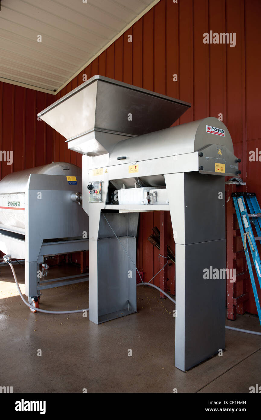 Grape processer and crusher at a winery Stock Photo