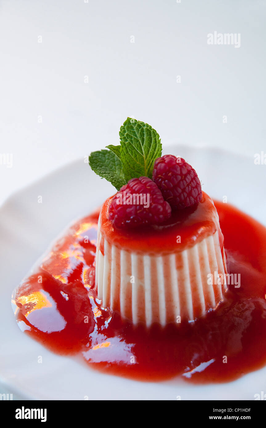 Dessert: Cottage cheese with strawberry jam. Close view. Stock Photo