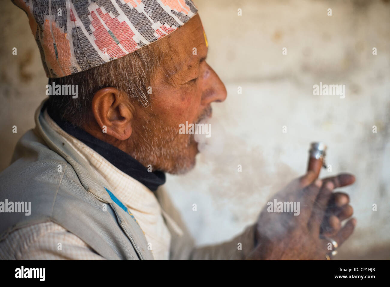 Nepali man smoking chilum ,Tatapani ,Nepal Stock Photo