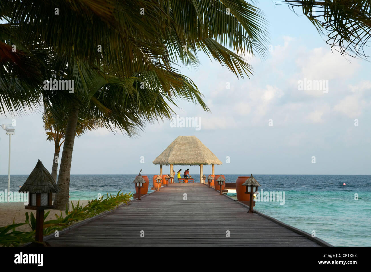 Windswept jetty on the Maldives, Indian Ocean. Stock Photo