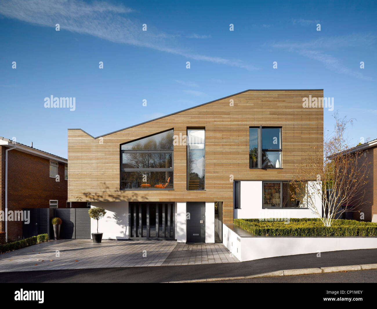 front timber clad houses