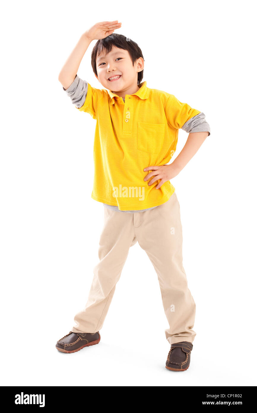 Cute boy looking afar Stock Photo - Alamy