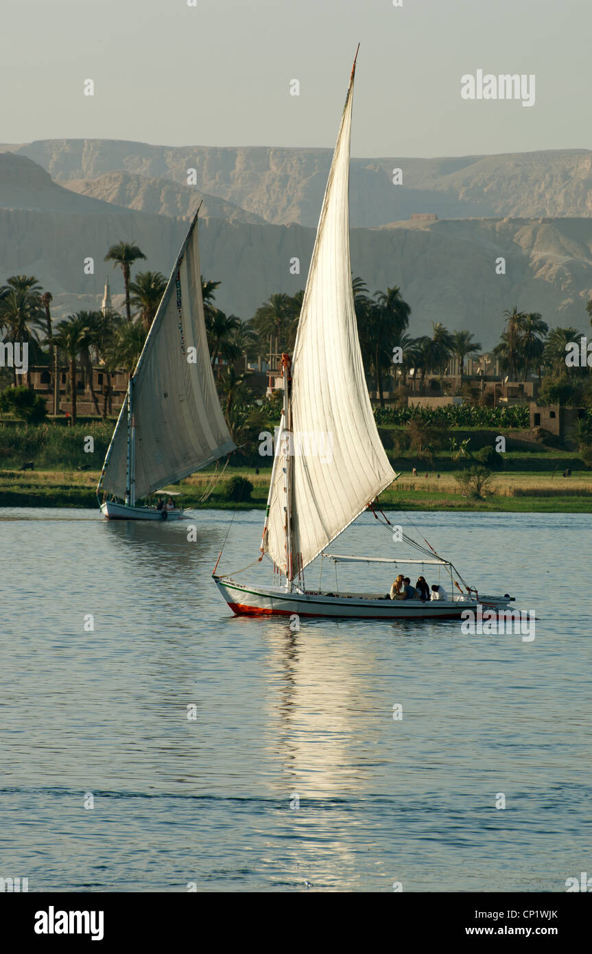 Feluccas sailing on the River Nile in Luxor Egypt Stock Photo - Alamy