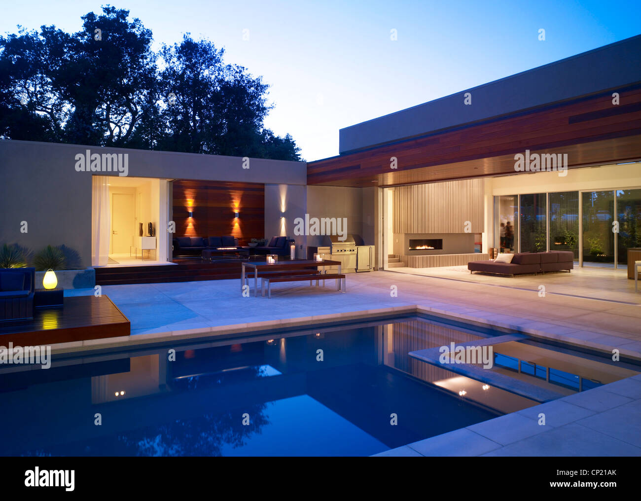 Swimming pool area with view into living room of Menlo Park Residence