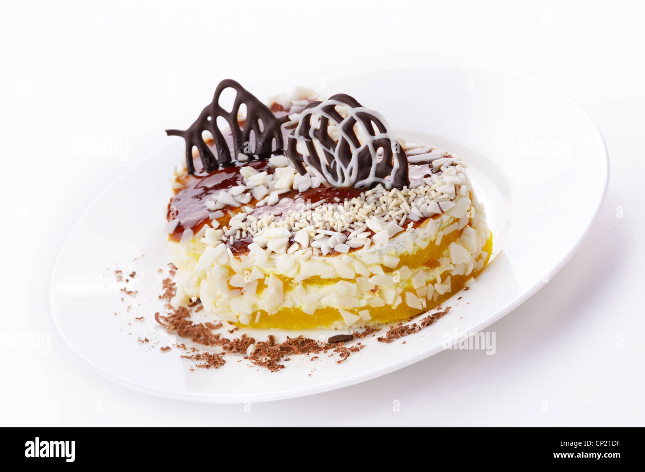 Milk chocolate cream cakes on the white plate Stock Photo - Alamy