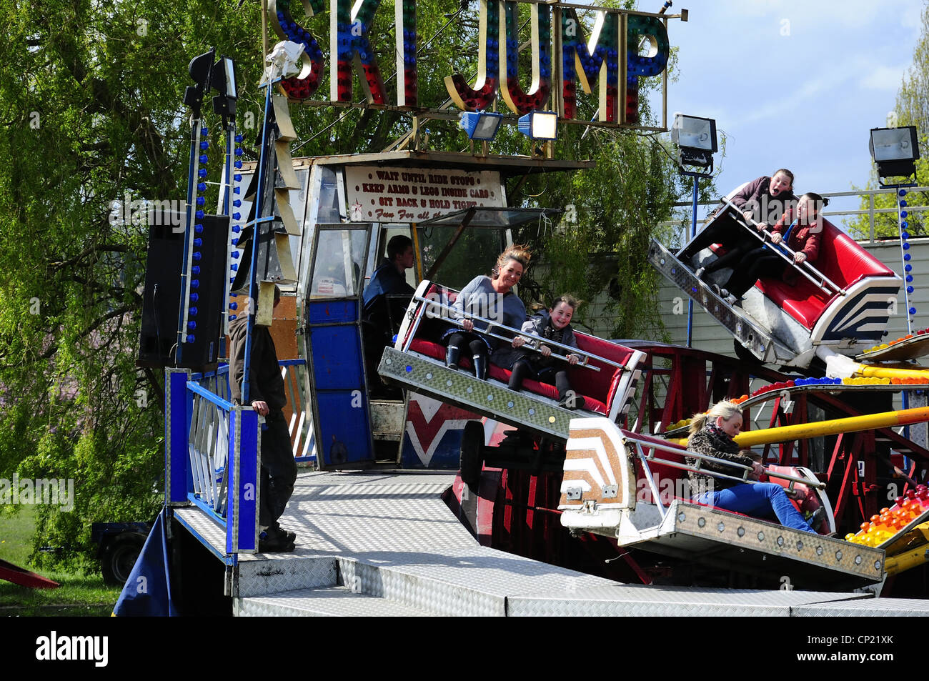 Children on fun fair ride hi-res stock photography and images - Alamy