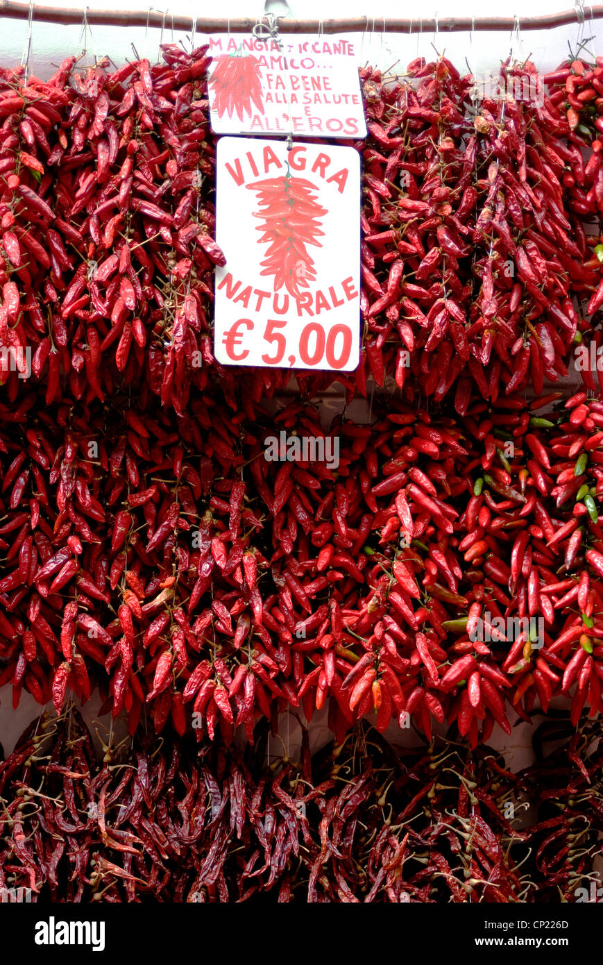 Chilis, known as the local viagra, for sale outside of a shop, Amalfi,  Amalfi Coast, Campania, Italy Stock Photo - Alamy